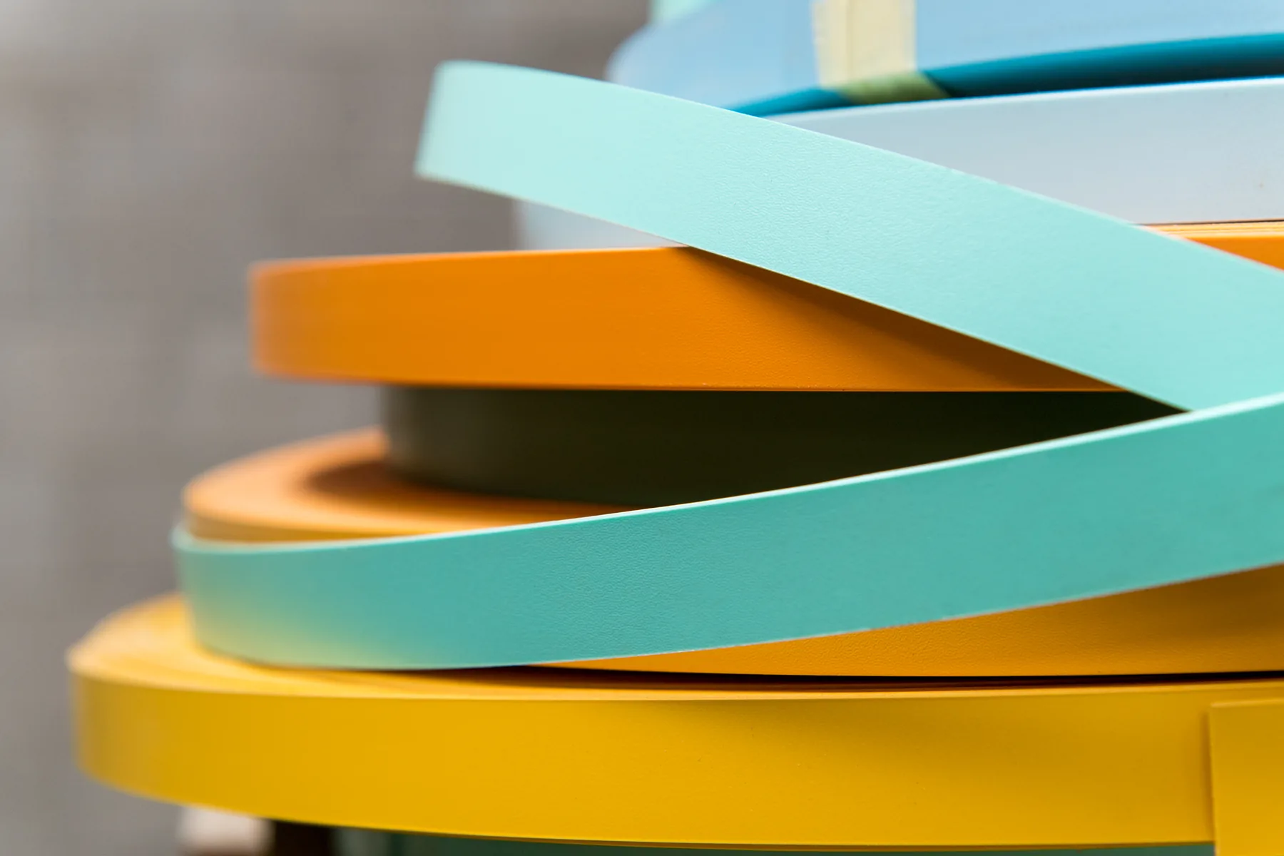 Rolls of edge banding in different colours